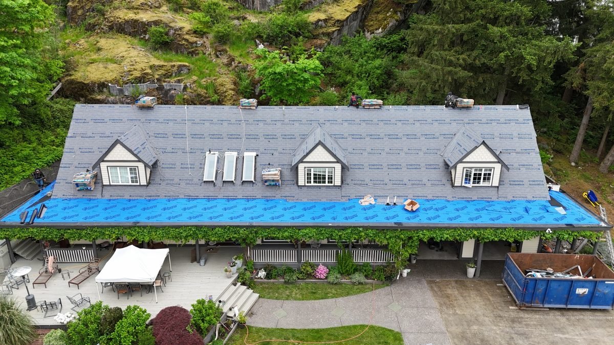 Roof protected with tarping ahead of repair