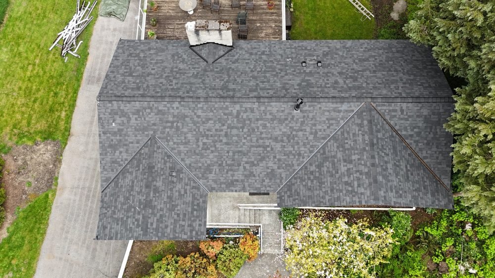 Finished asphalt shingle roof, overhead drone view