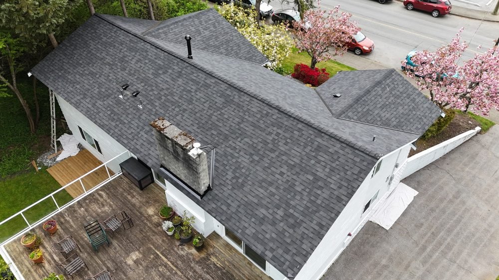 Finished grey shingle roof, aerial view