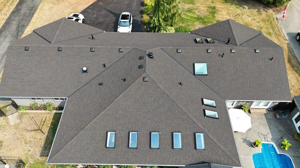 Finished roof with a row of skylights, overhead view